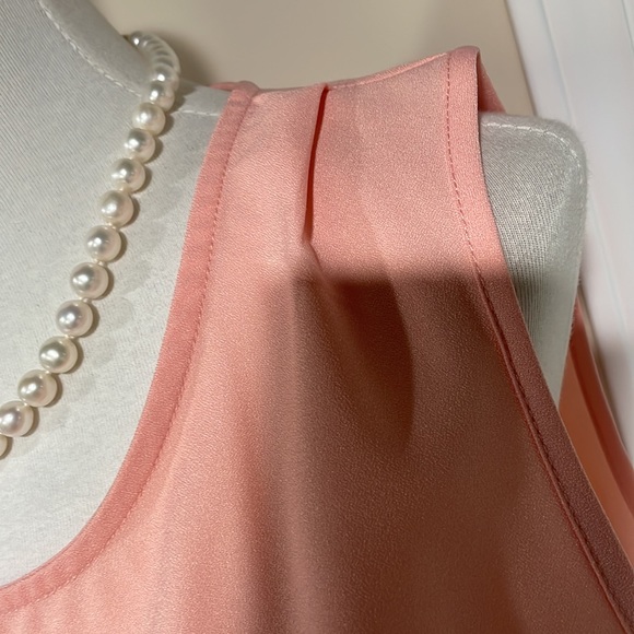 Peach shorts romper with cute features. - Picture 3 of 9